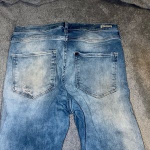Blue Jeans with Knee Cut out